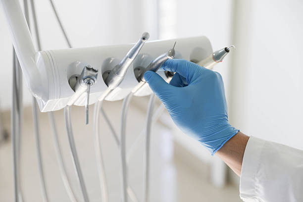 Professional Tooth Extraction technician working in St. Paris, OH